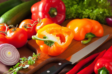 chopping healthy vegetables pepper tomato salad onion chili on r