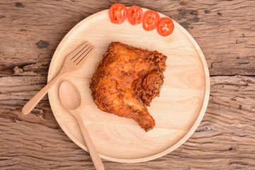 Fried chicken in wood dish