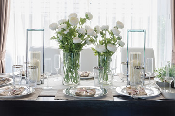 table set on dark brown wooden table in dinning room