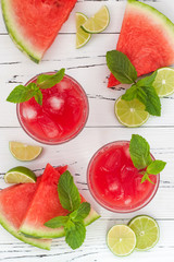 Watermelon lime cooler - refreshing summer watermelon drink with lime and mint. Top view