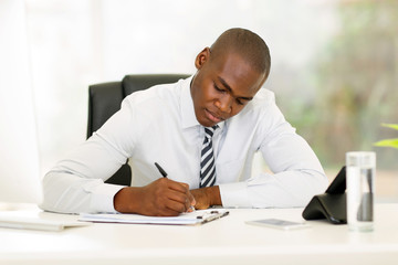 african american businessman working in office