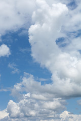 Blue sky with white clouds on blue style.