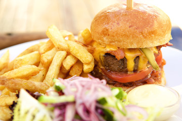 Bacon cheese hamburger with fries