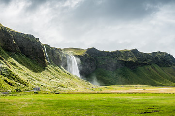 Beautiful waterfall Seljalandsfoss in south of Iceland