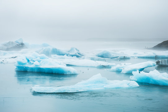 Beautiful blue icebergs in Jokulsarlon glacial lagoon, Iceland