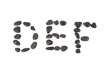 stone alphabet from black stones
