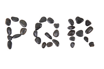 stone alphabet from black stones