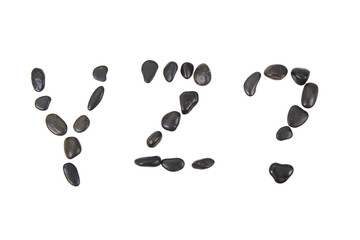 stone alphabet from black stones