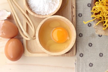 Making yellow noodle with egg and wheat flour.