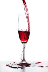 Champagne glass with spilled liquid
