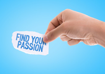 Piece of paper with the word Find Your Passion with blue background