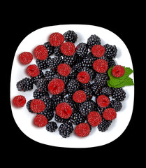 Blackberries isolated on a black background. raspberries