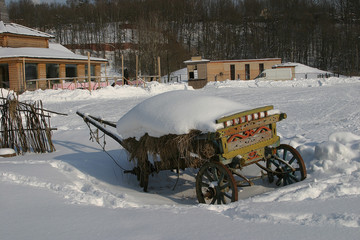 Fototapeta na wymiar The cart under the snow