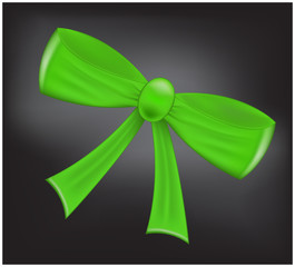 Green realistic  ribbon bow on dark background. Vector illustration