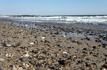 Fototapeta na wymiar pebbles at beach on heligoland`s dune