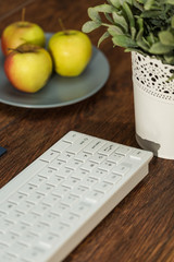 Keyboard on the wooden desk