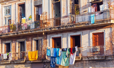 Fresh laundry on the balcony of old home, Havana..