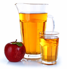 Full jug and glass of apple juice with fruit isolated on white