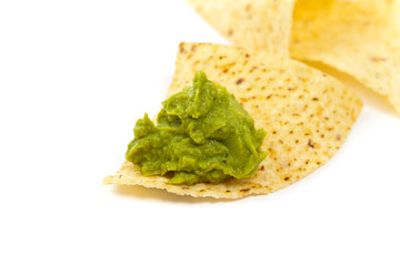 Guacamole and nachos. Selective focus.