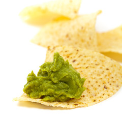 Guacamole and nachos. Selective focus.