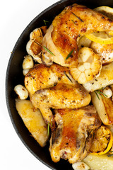 Frying Pan with Roasted chicken thighs. Selective focus.