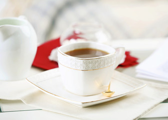 Cup of tea on table in living room