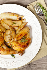 Garlic, Lemon and Rosemary Roasted Chicken. Selective focus.