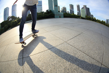 skateboarder skateboarding at sunrise city