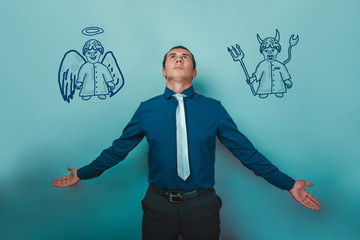 man businessman arms outstretched looking up with an angel on hi