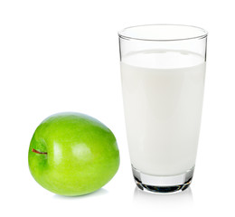 glass of milk and green apple isolated on white background
