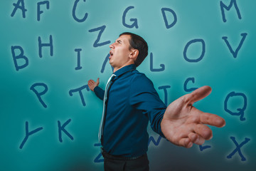 man male teacher businessman screaming his arms alphabet letters