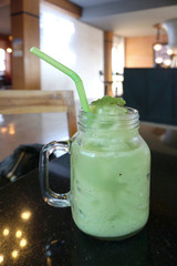 Green apple blended in glass mug