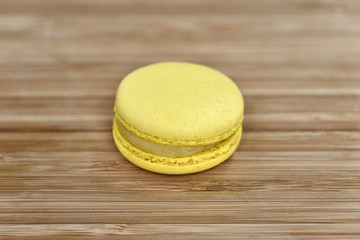 Yellow macron on wood plate