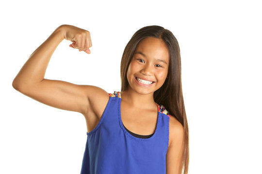 Strong, confident, beautiful Filipino Girl on White Background making a muscle