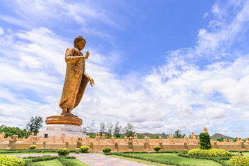 Obraz premium Phra Buddha Metta Pracha Thai Trai Lokanat Gandhara Anusorn memorial statue, Under The Royal Patronage of Her Majesty The Queen, Kanchanaburi Thailand.