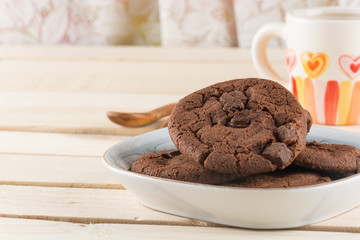 soft dark chocolate brownie cookies on wood