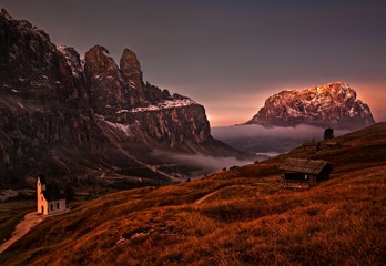 daybreak on passo Gardena in Dolomites