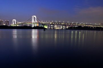 Fototapeta na wymiar Rainbow bridge night view in Odaiba city, Tokyo japan.