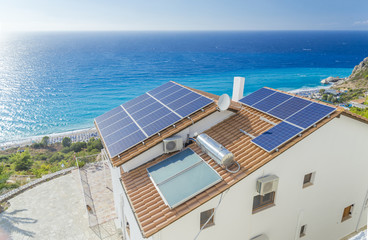 solar palels, photovoltaic, roof, sea  house
