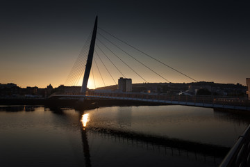 Fototapeta na wymiar The Millennium bridge, Swansea, also known as the Sail bridge.