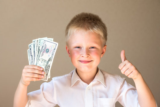 child with money (dollars)