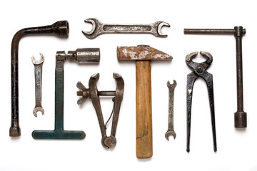 Old rusty mechanic tools isolated on white