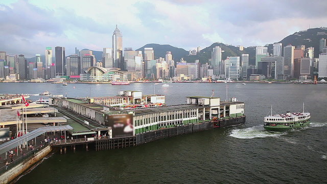 View of Victoria Harbour and ferry terminal in Hong Kong