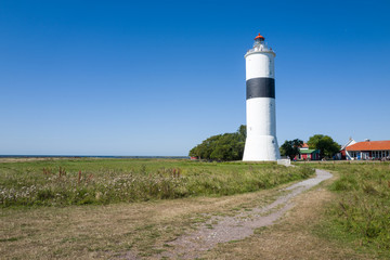 Fototapeta na wymiar Lighthouse “Långe Jan” (= Tall Jan) at Ottenby on the southern tip of Swedish Baltic Sea island Oland. 