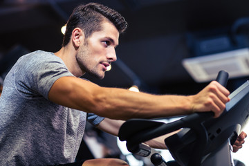 Man workout on a fitness machine