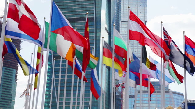 Flags of different countries waving in wind