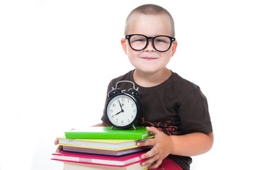 Back to school. Time to school.Cute little boy studying at the library and smiling