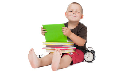 Back to school. Time to school.Cute little boy studying at the library and smiling
