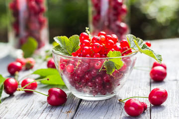 Fruits cherries currants wooden background