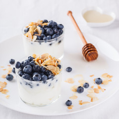 Homemade yoghurt with blueberry,almond and honey.selective focus